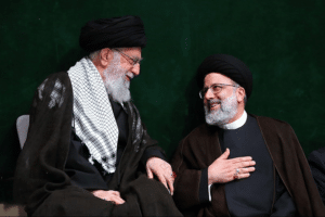 Ibrahim Raisi with Khamenei.